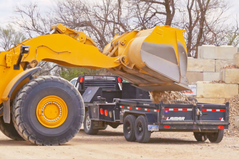 Loading trailer with rock